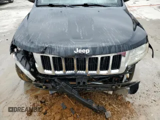 2012 Jeep Grand Cherokee Limited z VIN 1C4RJFBT7CC190025, wystawiony jako Copart lot #47460405 z przebiegiem 140 048 mil mil oraz Szkoda całkowita • Salvage title. Historia ofert i sprzedaży dostępna na DreamBid. Obrazek 11.