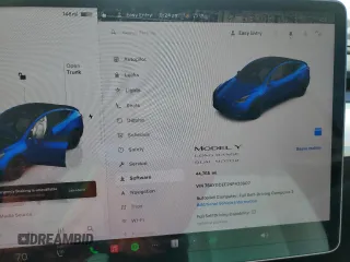 2022 Tesla Model Y Long Range z VIN 7SAYGDEE2NF433907, wystawiony jako Copart lot #54402215 z przebiegiem 44 765 mil mil oraz Szkody całkowita. Historia ofert i sprzedaży dostępna na DreamBid. Obrazek 9.