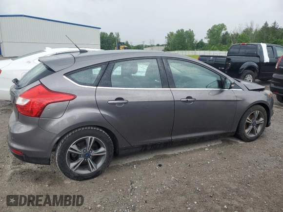 2014 Ford Focus Titanium with VIN 1FADP3N20EL329415, listed as a Copart auction lot 60881115 with 97,382 mi miles and Salvage title. Bid and sale history available at DreamBid. Image 3.