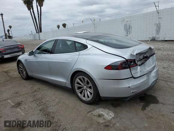 2015 Tesla Model S 85D with VIN 5YJSA1H28FFP78686, listed as a Copart auction lot 53310595 with 69,682 mi miles and Salvage Title. Bid and sale history available at carsss.com. Image 2.