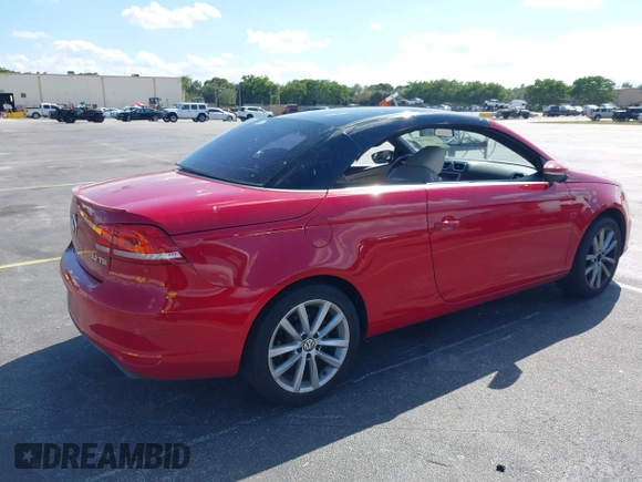 2013 Volkswagen Eos Komfort with VIN WVWBW8AH9DV008763, listed as a IAAI auction lot 41893700 with 53,766 mi miles and . Bid and sale history available at DreamBid. Image 4.