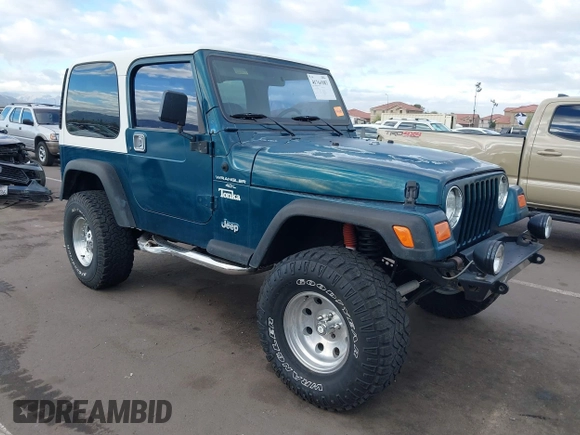 1998 Jeep Wrangler Sport with VIN 1J4FY19S7WP787679, listed as a IAAI auction lot 41764883 with 134,144 mi miles. Bid and sale history available at carsss.com. Image 1.