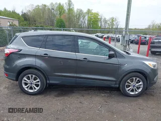 2017 Ford Escape SE with VIN 1FMCU9GD1HUC27843, listed as a IAAI auction lot 42009686 with 111,290 mi miles and . Bid and sale history available at DreamBid. Image 13.