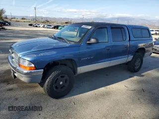 2001 Dodge Dakota z VIN 1B7HL2AX71S339829, wystawiony jako Copart lot #44539825 z przebiegiem 183 961 mil mil oraz Szkoda całkowita • Salvage title. Historia ofert i sprzedaży dostępna na DreamBid. Obrazek 1.