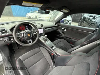 2018 Porsche 718 Cayman S z VIN WP0AB2A8XJK279655, wystawiony jako Copart lot #60089495 z przebiegiem 59 291 mil mil oraz Czysty tytuł • Clean title. Historia ofert i sprzedaży dostępna na DreamBid. Obrazek 9.