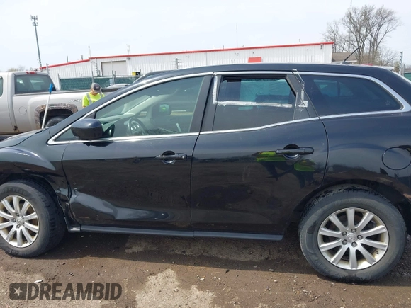 2011 Mazda CX-7 i Sport with VIN JM3ER2B56B0361209, listed as a IAAI auction lot 42013527 with 169,525 mi miles and . Bid and sale history available at DreamBid. Image 14.