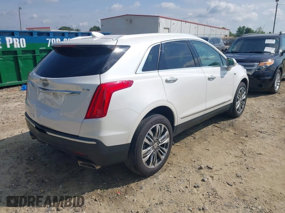 2018 Cadillac XT5 Premium Luxury FWD with VIN 1GYKNERS4JZ128051, listed as a IAAI auction lot 42296609 with 86,661 mi miles and . Bid and sale history available at DreamBid. Image 4.