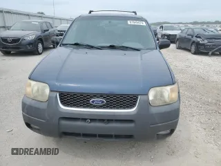 2001 Ford Escape XLT with VIN 1FMYU03131KF10968, listed as a Copart auction lot 67849474 with 197,328 mi miles and Salvage Title. Bid and sale history available at carsss.com. Image 5.