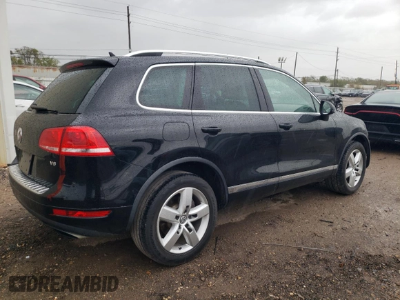 2013 Volkswagen Touareg Lux with VIN WVGEF9BP0DD002814, listed as a Copart auction lot 83015434 with 143,320 mi miles and Salvage Title. Bid and sale history available at DreamBid. Image 3.