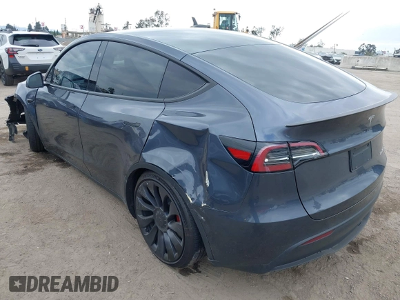 2023 Tesla Model Y Performance z VIN 7SAYGDEF1PF925274, wystawiony jako IAAI lot #42078813 z przebiegiem 20 422 mil mil oraz . Historia ofert i sprzedaży dostępna na DreamBid. Obrazek 3.