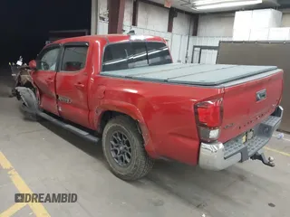 2018 Toyota Tacoma SR with VIN 3TMCZ5AN0JM166978, listed as a IAAI auction lot 41936143 with 129,674 mi miles. Bid and sale history available at carsss.com. Image 3.