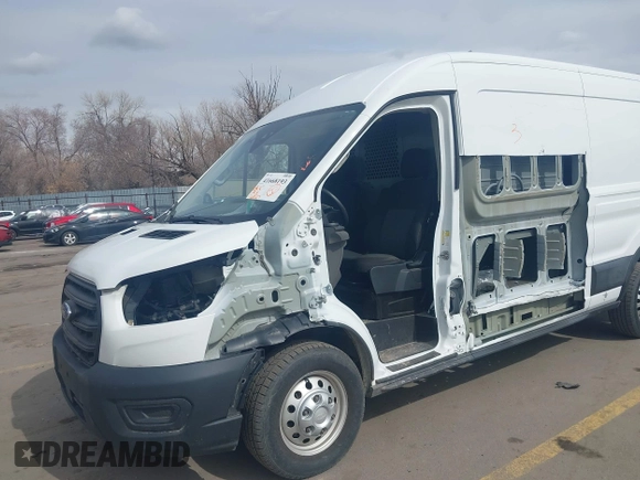 2020 Ford Transit Cargo with VIN 1FTBR2CG1LKB43034, listed as a IAAI auction lot 41668193 with 56,827 mi miles and . Bid and sale history available at DreamBid. Image 6.