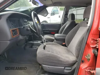 1997 Jeep Grand Cherokee Laredo with VIN 1J4GZ58S8VC601342, listed as a Copart auction lot 65360204 with 139,036 mi miles and Salvage Title. Bid and sale history available at carsss.com. Image 7.