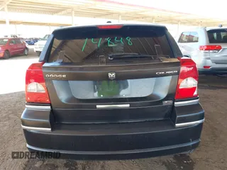 2010 Dodge Caliber SXT z VIN 1B3CB4HA3AD612829, wystawiony jako IAAI lot #42303635 z przebiegiem 230 191 mil mil oraz . Historia ofert i sprzedaży dostępna na DreamBid. Obrazek 15.