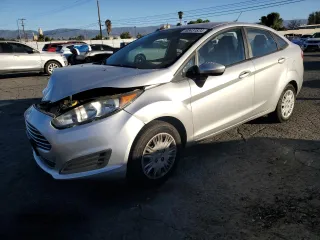 2015 Ford Fiesta S with VIN 3FADP4AJ1FM221551, listed as a Copart auction lot 83431834 with 62,461 mi miles and Salvage title. Bid and sale history available at DreamBid. Image 1.