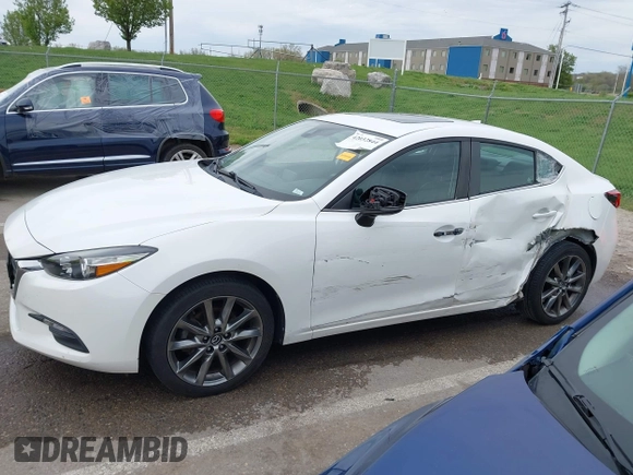 2018 Mazda 3 Touring with VIN 3MZBN1V32JM190611, listed as a IAAI auction lot 42032844 with 63,493 mi miles and . Bid and sale history available at DreamBid. Image 15.