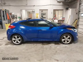 2014 Hyundai Veloster with VIN KMHTC6AD4EU196870, listed as a IAAI auction lot 41207663 with 119,252 mi miles. Bid and sale history available at carsss.com. Image 13.