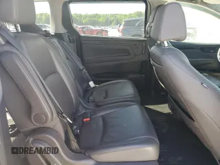 2019 Honda Odyssey Elite z VIN 5FNRL6H97KB078414, wystawiony jako Copart lot #57327895 z przebiegiem 119 259 mil mil oraz Szkoda całkowita • Salvage title. Historia ofert i sprzedaży dostępna na DreamBid. Obrazek 11.