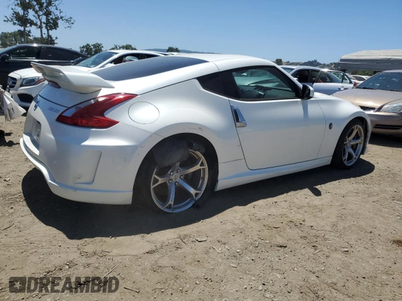 2011 Nissan 370Z Touring z VIN JN1AZ4EH7BM551606, wystawiony jako Copart lot #57173945 z przebiegiem Nie podano mil oraz Szkoda całkowita • Salvage title. Historia ofert i sprzedaży dostępna na DreamBid. Obrazek 3.