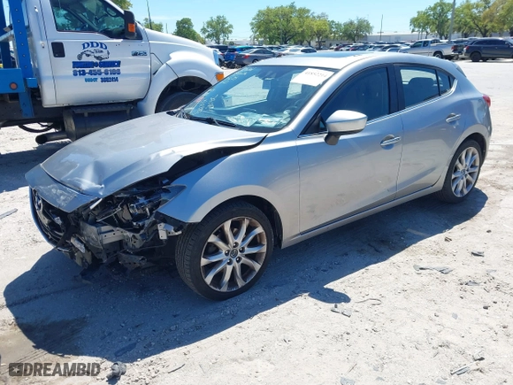 2014 Mazda Mazda3 s Grand Touring with VIN JM1BM1M31E1191128, listed as a IAAI auction lot 41852214 with 97,474 mi miles. Bid and sale history available at carsss.com. Image 17.