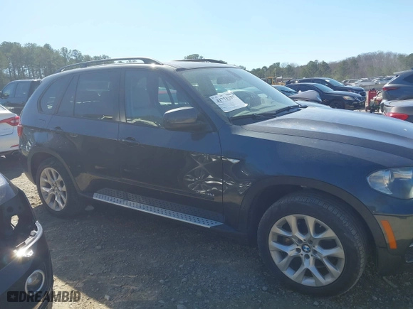 2011 BMW X5 35i with VIN 5UXZV4C51BL740731, listed as a IAAI auction lot 41771257 with 148,638 mi miles. Bid and sale history available at carsss.com. Image 13.