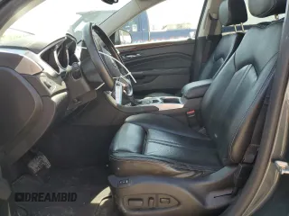 2012 Cadillac SRX Performance Collection z VIN 3GYFNEE31CS602568, wystawiony jako Copart lot #54751375 z przebiegiem 144 228 mil mil oraz Szkody całkowita. Historia ofert i sprzedaży dostępna na DreamBid. Obrazek 7.