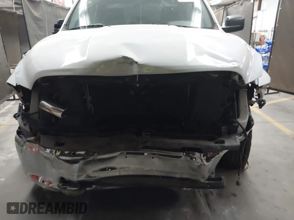 2012 Ram 1500 Tradesman with VIN 1C6RD6KP2CS280836, listed as a IAAI auction lot 40880119 with 84,748 mi miles and . Bid and sale history available at DreamBid. Image 6.