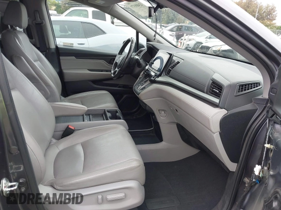 2018 Honda Odyssey Touring with VIN 5FNRL6H88JB062213, listed as a IAAI auction lot 42489379 with 90,578 mi miles and . Bid and sale history available at DreamBid. Image 5.