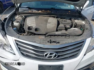 2015 Hyundai Azera Limited with VIN KMHFH4JG7FA476458, listed as a IAAI auction lot 41893979 with 149,114 mi miles and . Bid and sale history available at DreamBid. Image 10.
