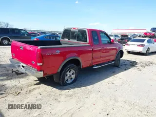 2003 Ford F-150 XL with VIN 2FTRX18L13CA49907, listed as a IAAI auction lot 41888674 with 132,944 mi miles. Bid and sale history available at carsss.com. Image 4.