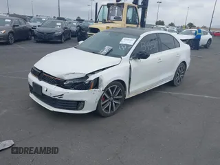 2013 Volkswagen Jetta GLI Autobahn with VIN 3VW4A7AJ7DM222369, listed as a IAAI auction lot 41959351 with 155,536 mi miles and . Bid and sale history available at DreamBid. Image 2.