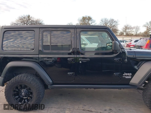 2019 Jeep Wrangler Unlimited Sport S with VIN 1C4HJXDN6KW686480, listed as a IAAI auction lot 41300842 with 67,359 mi miles and . Bid and sale history available at DreamBid. Image 13.