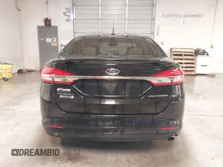 2017 Ford Fusion Titanium with VIN 3FA6P0SUXHR208653, listed as a IAAI auction lot 41312067 with 62,601 mi miles and . Bid and sale history available at DreamBid. Image 16.