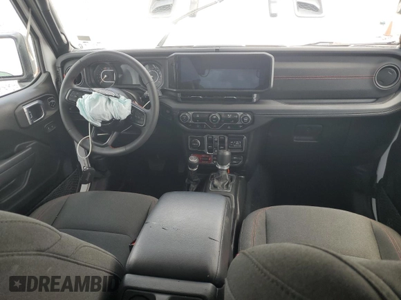 2024 Jeep Wrangler Rubicon z VIN 1C4PJXFG9RW336006, wystawiony jako Copart lot #60237785 z przebiegiem 24 571 mil mil oraz Czysty tytuł • Clean title. Historia ofert i sprzedaży dostępna na DreamBid. Obrazek 8.
