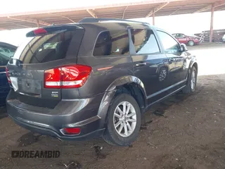 2015 Dodge Journey SXT with VIN 3C4PDCBG6FT569512, listed as a IAAI auction lot 42532676 with 98,952 mi miles and . Bid and sale history available at DreamBid. Image 4.