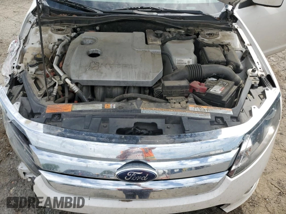 2012 Ford Fusion Hybrid с VIN 3FADP0L35CR184476, выставлен на аукционе Copart как лот 63907885 с пробегом 230 589 миль миль и Списание • Salvage title. История ставок и продаж доступна на DreamBid. Изображение 11.
