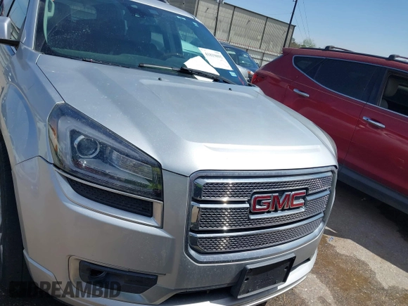 2014 GMC Acadia Denali z VIN 1GKKRTKD0EJ192610, wystawiony jako IAAI lot #41819095 z przebiegiem 121 075 mil mil oraz . Historia ofert i sprzedaży dostępna na DreamBid. Obrazek 6.