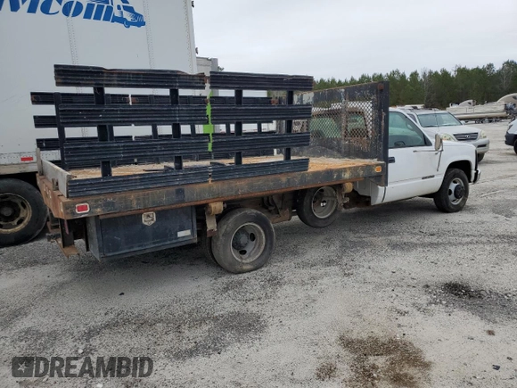 1999 GMC Sierra 1500 with VIN 1GDJC34R3XF087014, listed as a Copart auction lot 86367084 with 94,539 mi miles and Clean Title. Bid and sale history available at DreamBid. Image 3.