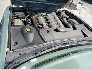 1999 Jaguar XJ with VIN SAJHX604XXC854217, listed as a Copart auction lot 56042735 with 127,092 mi miles and Salvage title. Bid and sale history available at DreamBid. Image 11.