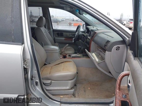2004 Kia Sorento LX with VIN KNDJC733945239632, listed as a IAAI auction lot 41094685 with 150,838 mi miles. Bid and sale history available at carsss.com. Image 5.