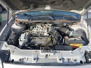 1999 Ford Taurus SE with VIN 1FAFP53U4XG223246, listed as a IAAI auction lot 41570969 with 59,064 mi miles. Bid and sale history available at carsss.com. Image 10.