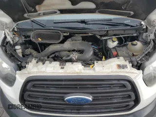 2017 Ford Transit z VIN 1FTYR1ZM5HKB36970, wystawiony jako Copart lot #55703045 z przebiegiem 392 008 mil mil oraz Szkoda całkowita • Salvage title. Historia ofert i sprzedaży dostępna na DreamBid. Obrazek 12.