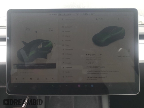 2023 Tesla Model Y Long Range with VIN 7SAYGAEE0PF642810, listed as a Copart auction lot 52181655 with 74,922 mi miles and Salvage Title. Bid and sale history available at DreamBid. Image 9.