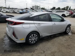 2022 Toyota Prius LE с VIN JTDKAMFP5N3202100, выставлен на аукционе Copart как лот 59570825 с пробегом 32 941 миль миль и Списание • Salvage title. История ставок и продаж доступна на DreamBid. Изображение 3.