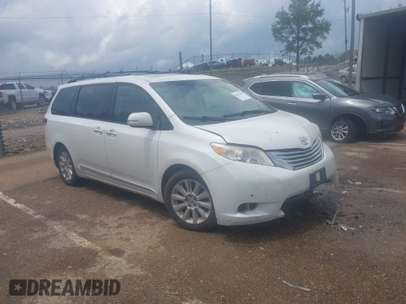 2014 Toyota Sienna XLE with VIN 5TDYK3DC2ES517663, listed as a IAAI auction lot 42171862 with 143,447 mi miles and . Bid and sale history available at DreamBid. Image 1.