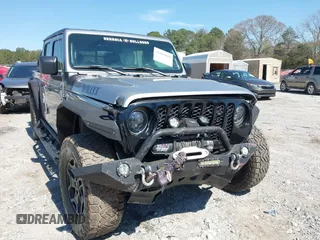 2021 Jeep Gladiator Freedom with VIN 1C6HJTAG3ML540967, listed as a IAAI auction lot 41883858 with 92,287 mi miles and . Bid and sale history available at DreamBid. Image 6.