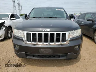 2011 Jeep Grand Cherokee Laredo with VIN 1J4RR4GGXBC567450, listed as a Copart auction lot 60056085 with 165,077 mi miles and Salvage title. Bid and sale history available at DreamBid. Image 5.