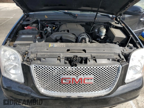 2007 GMC Yukon Denali z VIN 1GKFK63887J356584, wystawiony jako Copart lot #53118415 z przebiegiem 166 215 mil mil oraz Szkoda całkowita • Salvage title. Historia ofert i sprzedaży dostępna na DreamBid. Obrazek 12.