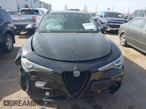 2018 Alfa Romeo Stelvio Sport z VIN ZASFAKPN0J7B71013, wystawiony jako IAAI lot #41938050 z przebiegiem Nie podano mil oraz . Historia ofert i sprzedaży dostępna na DreamBid. Obrazek 12.