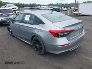 2023 Honda Civic Sport with VIN 2HGFE2F55PH501595, listed as a IAAI auction lot 42355942 with 8,924 mi miles and . Bid and sale history available at DreamBid. Image 3.